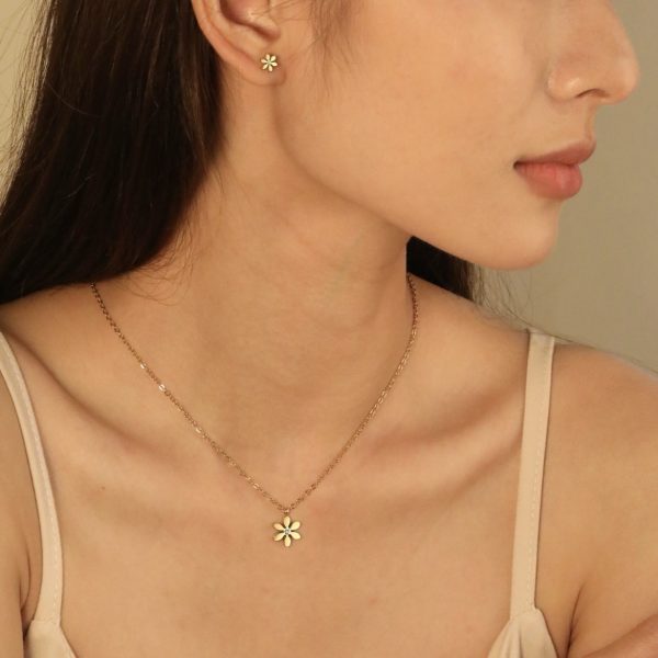 Conjunto flor dorada