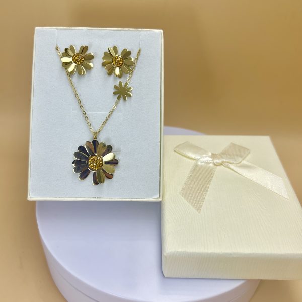 Conjunto flor dorada