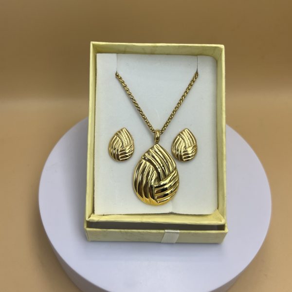 Conjunto dorado gota