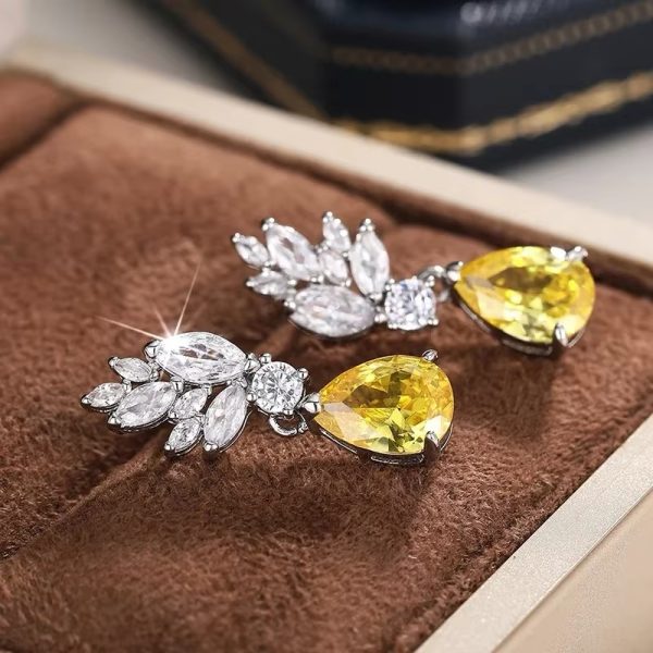 Aro piedras amarillo blanco