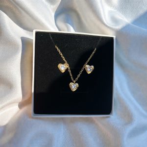Conjunto corazón dorado piedra