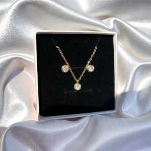 Conjunto dorado piedra